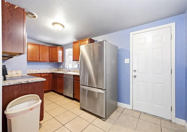 Photo 4 of Single family home for sale at 1225 Dallas St, Aurora, CO 80010 | MLS# 8661911 | Listing updated on 2026-08-13