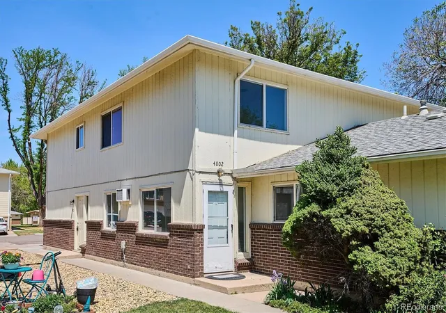 Photo 1 of Townhouse for sale at 7309 W Hampden Ave #4802, Denver, CO 80227 | MLS# 2133233 | Listing updated on 2026-07-21