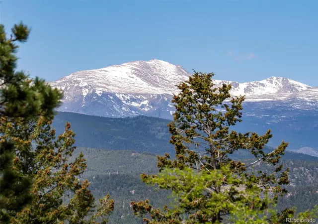 Photo 3 of Single family home for sale at 26761 Hilltop Rd, Evergreen, CO 80439 | MLS# 2426752 | Listing updated on 2026-10-13