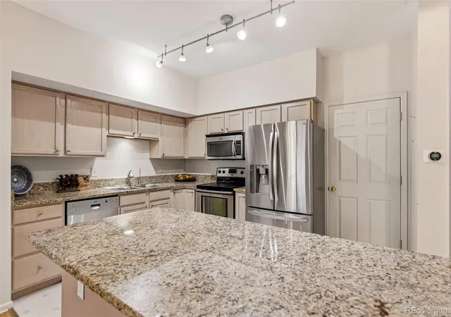 Photo 2 of Condo for sale at 4003 S Carson St #B, Aurora, CO 80014 | MLS# 4508351 | Listing updated on 2026-09-04