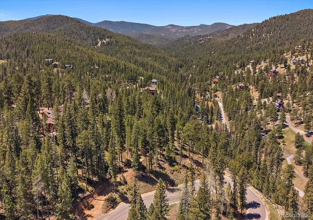 Photo 2 of Land for sale at 6855 Lynx Lair Rd, Evergreen, CO 80439 | MLS# 6200095 | Listing updated on 2026-07-28