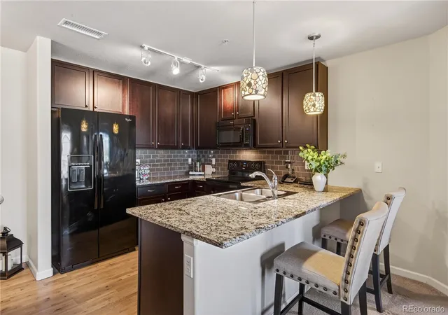 Listing Photo 4 - Condo for sale in building located at 1062 Rockhurst Dr, Littleton, CO 80129 - Unit #202