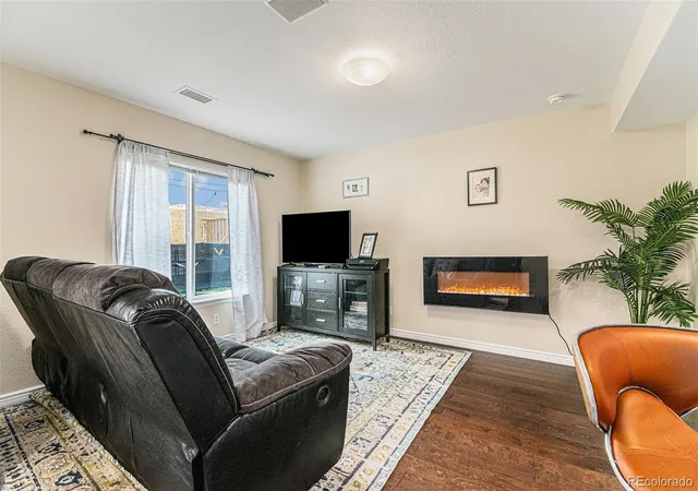 Photo 3 of Townhouse for sale at 5890 Ceylon St #D, Denver, CO 80249 | MLS# 7864359 | Listing updated on 2026-10-22