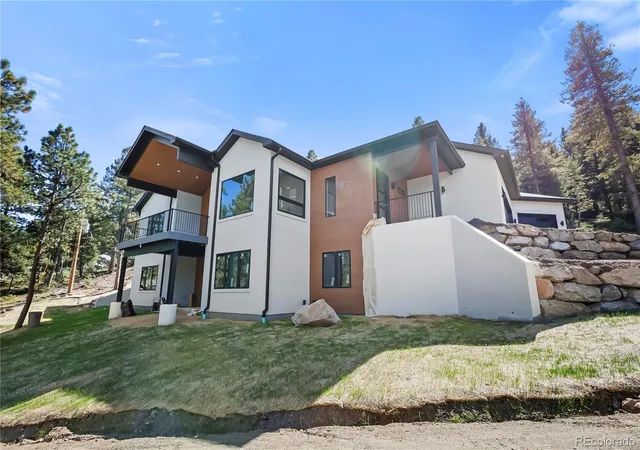 Photo 2 of Single family home for sale at 5815 Herzman Dr, Evergreen, CO 80439 | MLS# 6188659 | Listing updated on 2026-10-23