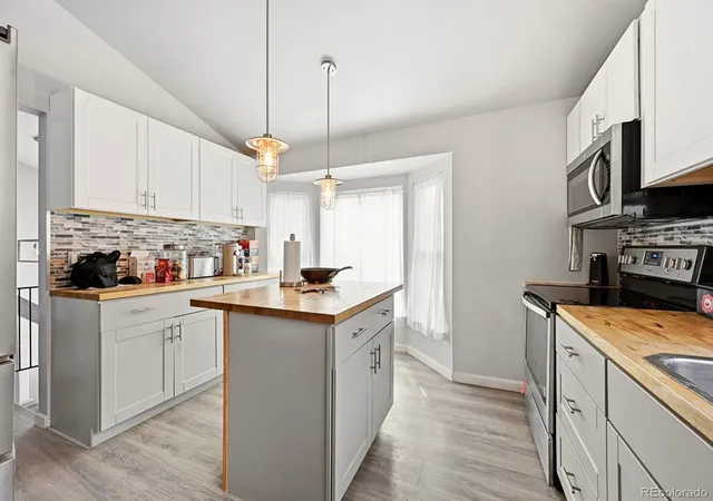 Photo 3 of Single family home for sale at 7649 W Frost Dr, Littleton, CO 80128 | MLS# 9811235 | Listing updated on 2026-10-03