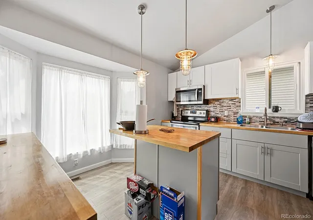 Photo 3 of Single family home for sale at 7649 W Frost Dr, Littleton, CO 80128 | MLS# 9811235 | Listing updated on 2026-10-03