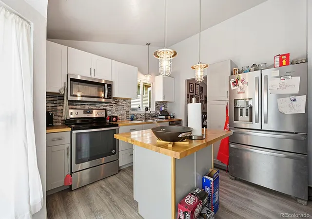 Photo 4 of Single family home for sale at 7649 W Frost Dr, Littleton, CO 80128 | MLS# 9811235 | Listing updated on 2026-10-03