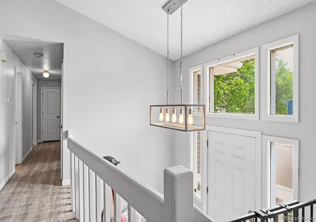 Photo 2 of Single family home for sale at 7649 W Frost Dr, Littleton, CO 80128 | MLS# 9811235 | Listing updated on 2026-10-03