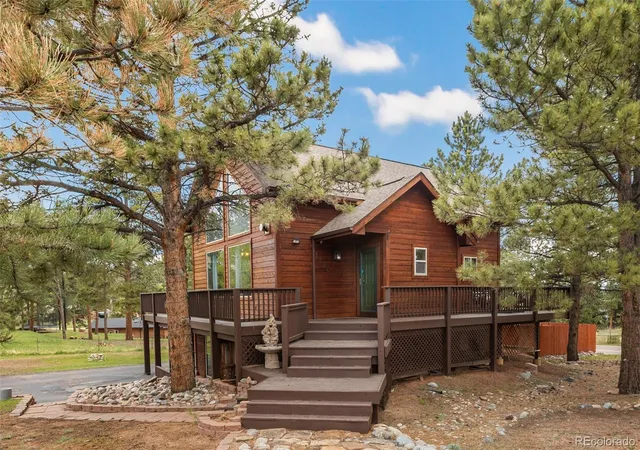 Photo 2 of Single family home for sale at 1280 Chippewa Trl, Woodland Park, CO 80863 | MLS# 3051827 | Listing updated on 2026-09-20