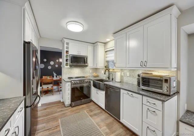 Photo 3 of Single family home for sale at 9093 W Warren Dr, Lakewood, CO 80227 | MLS# 2426460 | Listing updated on 2026-08-28