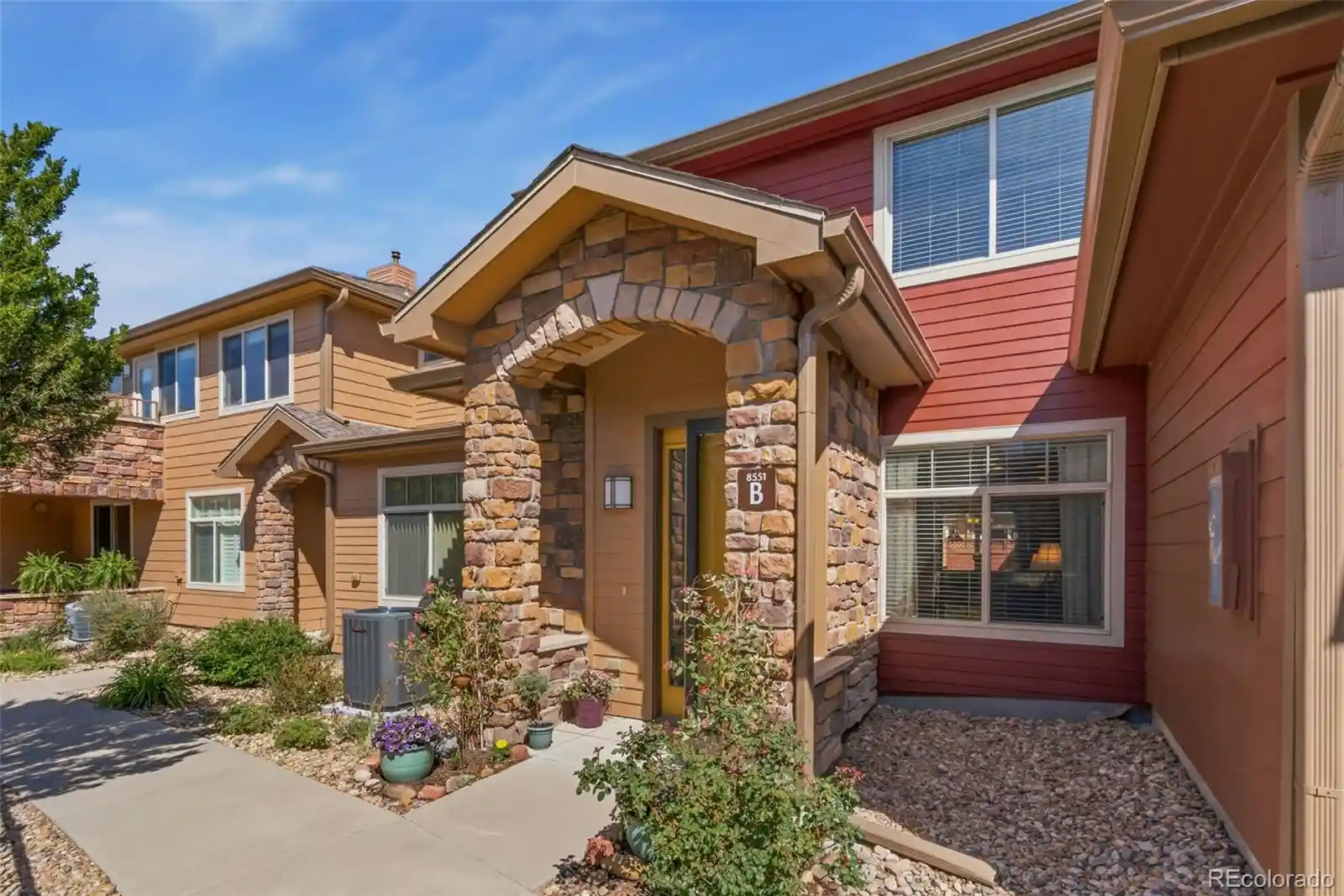 Listing Photo 1 - Condo for sale in 8551 Gold Peak Dr located at 8551 Gold Peak Dr, Highlands Ranch, CO 80130 - Unit 8551 Gold Peak Dr