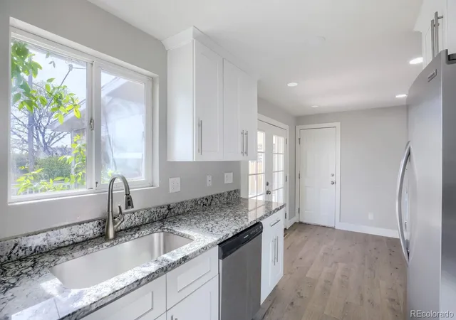 Photo 3 of Single family home for sale at 8356 Mitze Dr, Denver, CO 80221 | MLS# 2693010 | Listing updated on 2026-09-25