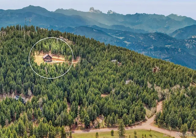 Photo 1 of Single family home for sale at 25504 Mountain Moss Ct, Evergreen, CO 80439 | MLS# 2253516 | Listing updated on 2026-10-03