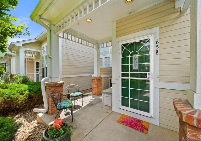 Photo 3 of Townhouse for sale at 658 S Yarrow St, Lakewood, CO 80226 | MLS# 2186638 | Listing updated on 2026-08-26