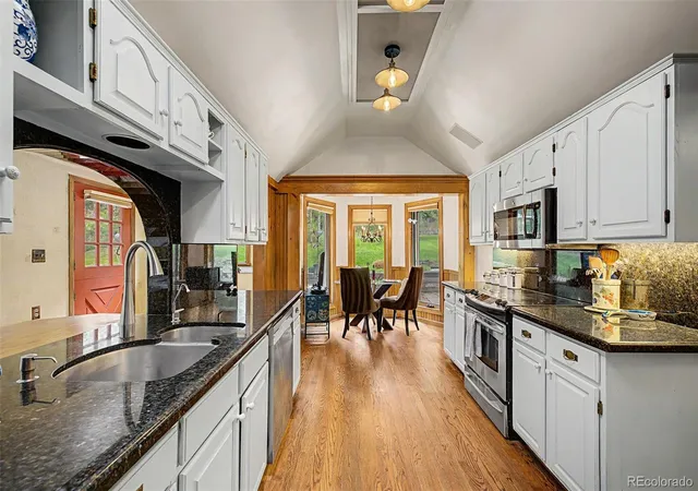 Photo 3 of Single family home for sale at 8297 S Deer Crk Cyn Rd, Littleton, CO 80127 | MLS# 5309966 | Listing updated on 2026-10-03