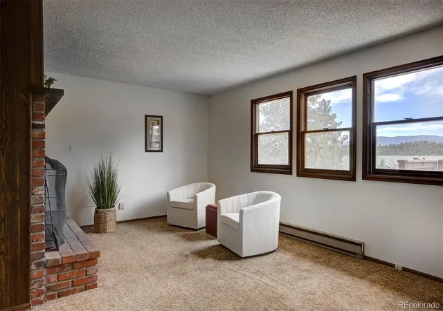 Photo 3 of Single family home for sale at 1899 Roland Dr, Bailey, CO 80421 | MLS# 7252304 | Listing updated on 2026-09-22