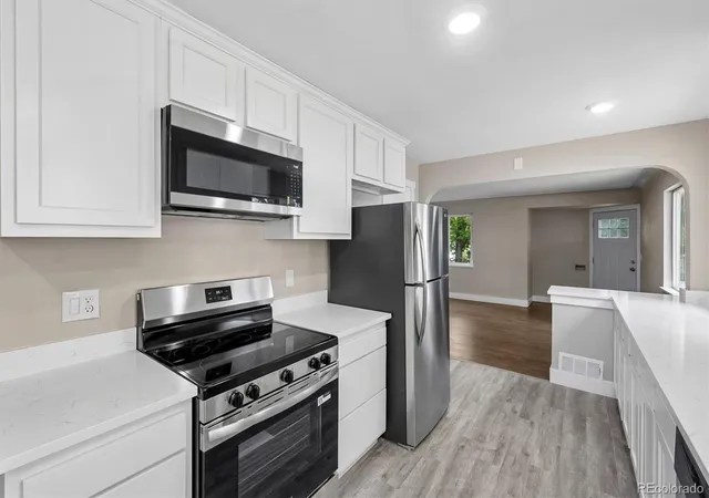 Photo 3 of Single family home for sale at 9801 E 8th Avenue, Aurora, CO 80010 | MLS# 2773546 | Listing updated on 2026-09-24