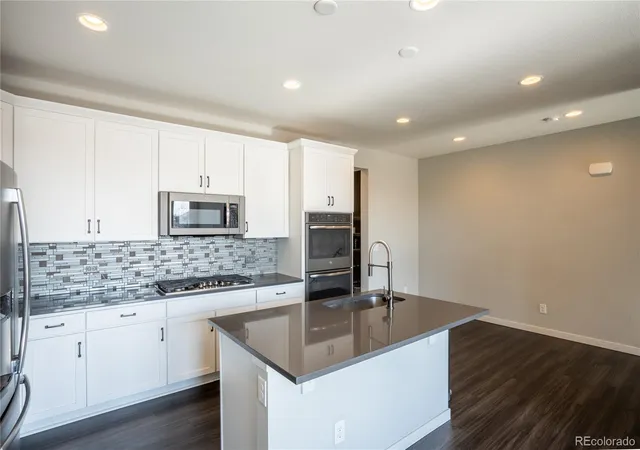 Photo 4 of Single family home for sale at 15858 E Broncos Pl, Englewood, CO 80112 | MLS# 3910382 | Listing updated on 2026-09-22