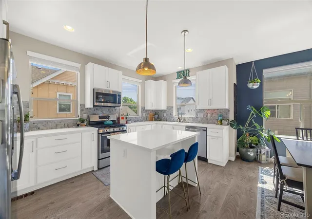 Photo 3 of Townhouse for sale at 9045 E 49th Place, Denver, CO 80238 | MLS# 1748709 | Listing updated on 2026-09-05