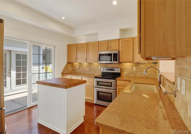 Photo 3 of Townhouse for sale at 8300 E Fairmount Dr #NN102, Denver, CO 80247 | MLS# 9415868 | Listing updated on 2026-10-01
