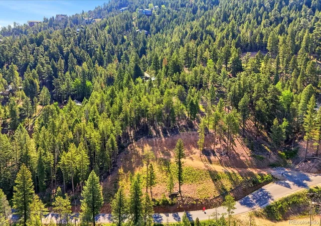 Photo 2 of Land for sale at 6824 Lynx Lair Rd, Evergreen, CO 80439 | MLS# 8461977 | Listing updated on 2026-06-24