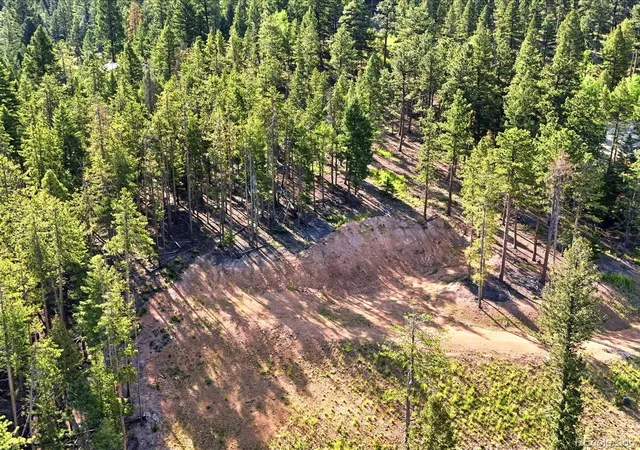 Photo 3 of Land for sale at 6824 Lynx Lair Rd, Evergreen, CO 80439 | MLS# 8461977 | Listing updated on 2026-06-24