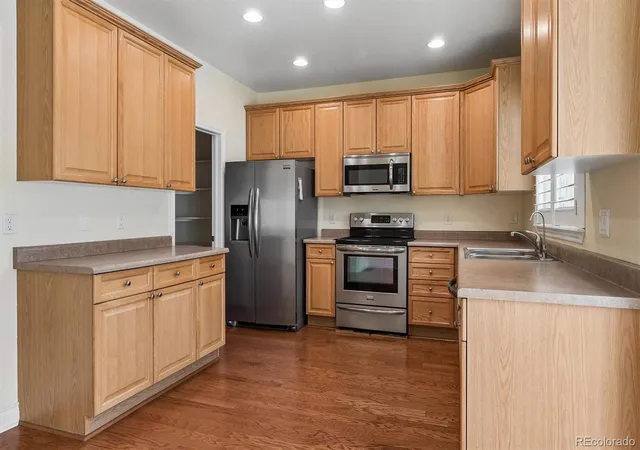 Photo 4 of Townhouse for sale at 11338 W Radcliffe Dr, Littleton, CO 80127 | MLS# 6205428 | Listing updated on 2026-08-17