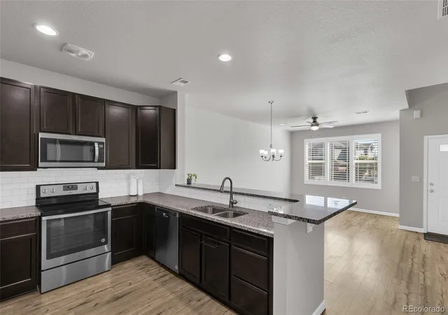 Photo 3 of Townhouse for sale at 1756 S Buchanan Cir, Aurora, CO 80018 | MLS# 8339093 | Listing updated on 2026-07-25