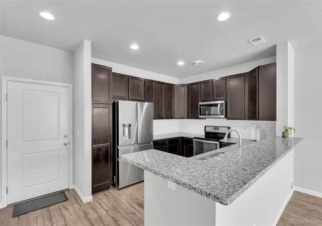 Photo 3 of Townhouse for sale at 1756 S Buchanan Cir, Aurora, CO 80018 | MLS# 8339093 | Listing updated on 2026-07-25