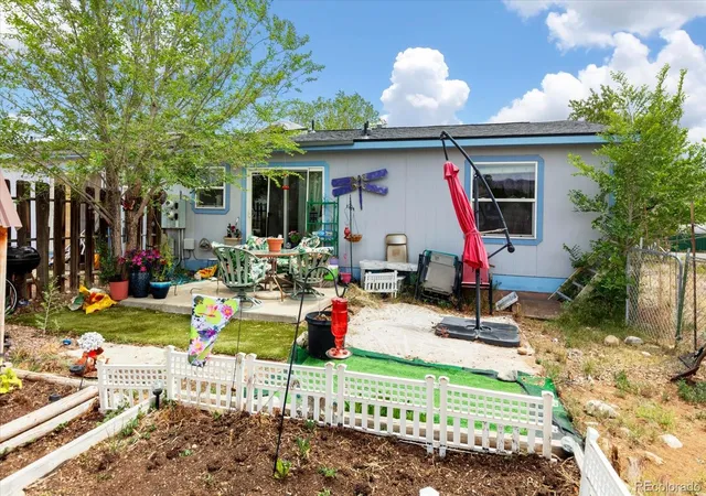 Listing Photo 2 - Condo for sale in building located at 102 & 104 Palmer Ave, Poncha Springs, CO 81242 - Unit #