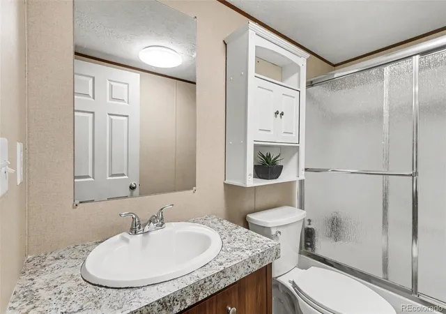 Homes for sale in Commerce City, CO | 7701 Brighton Blvd, Commerce City, CO 80022 | MLS# 5645431