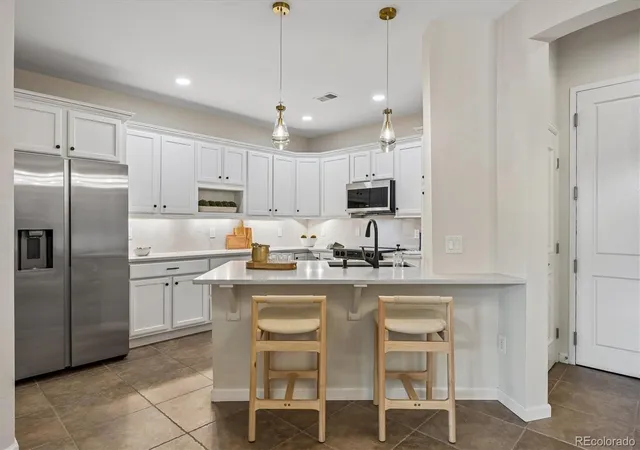 2nd image of 7820 Inverness Blvd #108, Englewood, CO 80112 | MLS# 2212018