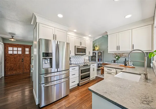 Photo 1 of Single family home for sale at 5873 W Maplewood Dr, Littleton, CO 80123 | MLS# 3110895 | Listing updated on 2026-09-30