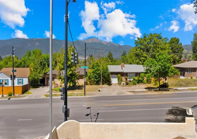 Listing Photo 2 - Condo for sale in building located at 1802 E Uintah St, Colorado Springs, CO 80909 - Unit #