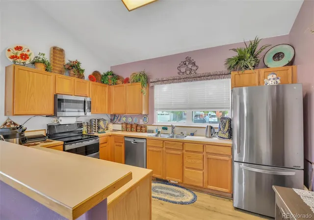 Photo 3 of Townhouse for sale at 15555 E 40th Avenue #7, Denver, CO 80239 | MLS# 8181724 | Listing updated on 2026-09-17