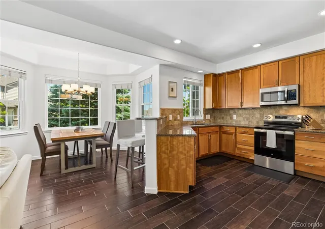 Photo 4 of Townhouse for sale at 6817 S Webster St #C, Littleton, CO 80128 | MLS# 8189494 | Listing updated on 2026-09-16