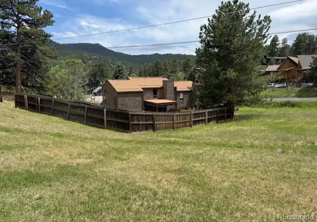 Photo 3 of Multi family home for sale at 28003 Iris Dr, Evergreen, CO 80439 | MLS# 9113908 | Listing updated on 2026-10-09