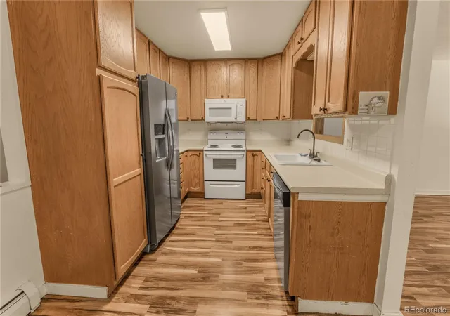 Photo 3 of Single family home for sale at 1619 S Brentwood St, Lakewood, CO 80232 | MLS# 9242321 | Listing updated on 2026-06-19