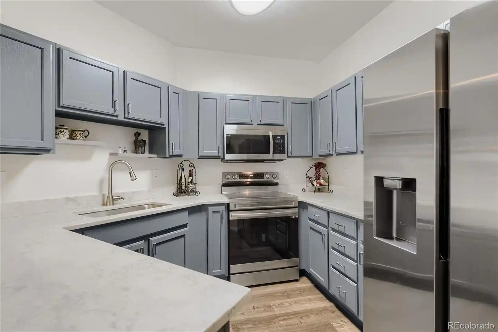 Listing Photo 1 - Condo for sale in 2896 W Riverwalk Cir located at 2896 W Riverwalk Cir, Littleton, CO 80123 - Unit #A109
