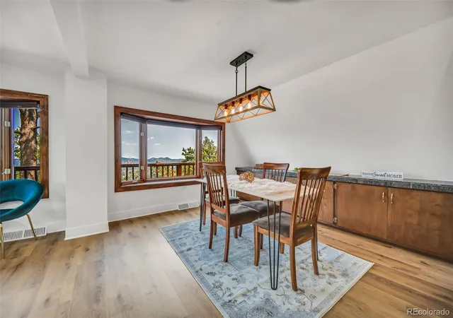 Photo 4 of Single family home for sale at 819 Hyland Dr, Evergreen, CO 80439 | MLS# 4333569 | Listing updated on 2026-08-10