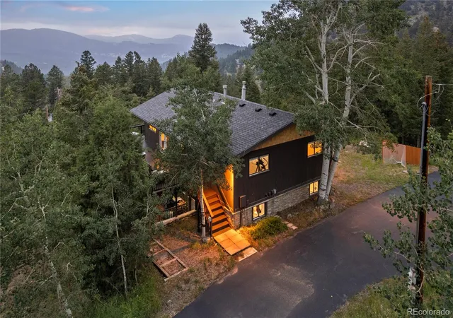 Photo 2 of Single family home for sale at 5457 Bear Mountain Dr, Evergreen, CO 80439 | MLS# 6689320 | Listing updated on 2026-10-02