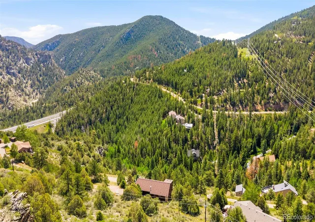 Photo 4 of Single family home for sale at 1649 Elk Valley Dr, Evergreen, CO 80439 | MLS# 4435718 | Listing updated on 2026-09-07