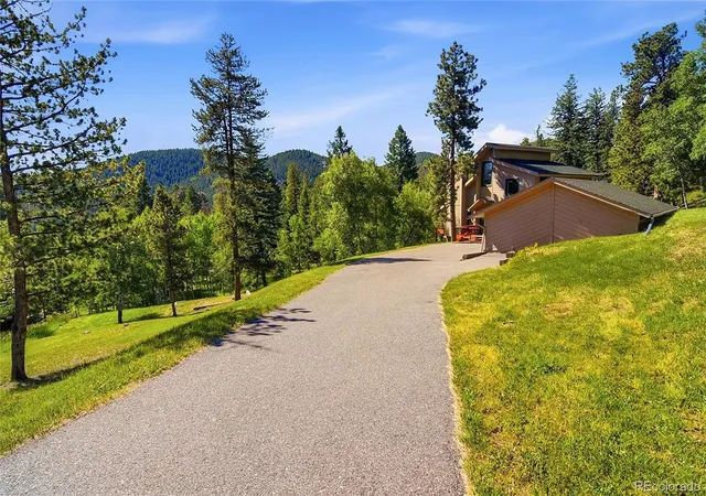 Photo 2 of Single family home for sale at 7167 Aspen Meadow Dr, Evergreen, CO 80439 | MLS# 6116922 | Listing updated on 2026-09-02