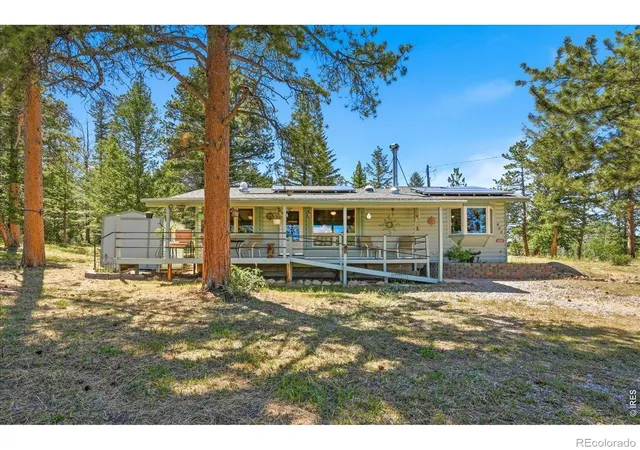 Photo 3 of Single family home for sale at 409 Shagwa Dr, Red Feather Lakes, CO 80545 | MLS# IR1062193 | Listing updated on 2026-10-03