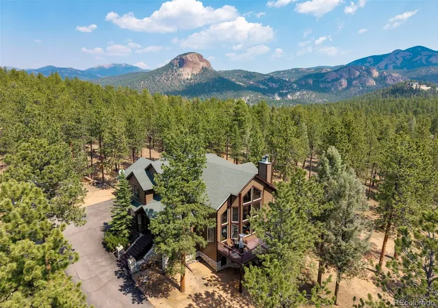 Photo 4 of Single family home for sale at 1734 Mount Evans Blvd, Pine, CO 80470 | MLS# 7124674 | Listing updated on 2026-09-02