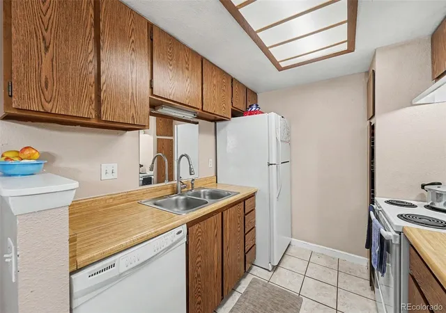 Listing Photo 3 - Condo for sale in building located at 3484 S Eagle St, Aurora, CO 80014 - Unit #104