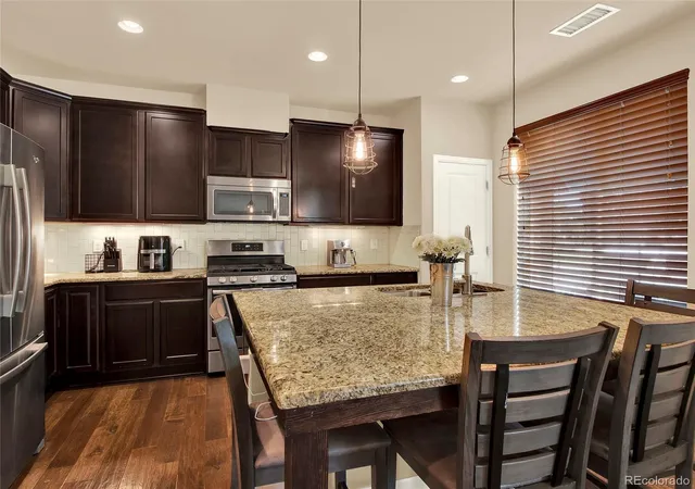 Photo 4 of Townhouse for sale at 8025 E 21st Avenue, Denver, CO 80238 | MLS# 3679427 | Listing updated on 2026-09-22