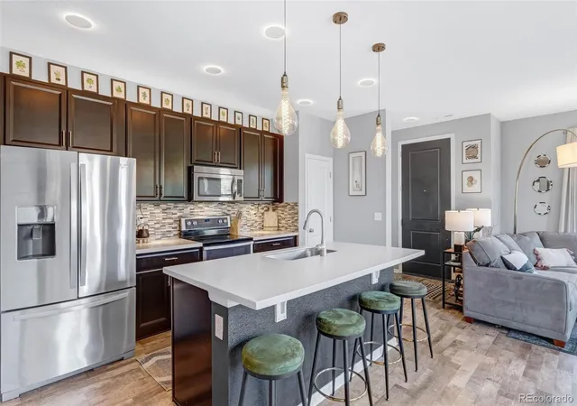 Photo 2 of Townhouse for sale at 1218 S Clinton St, Denver, CO 80247 | MLS# 9135444 | Listing updated on 2026-08-03