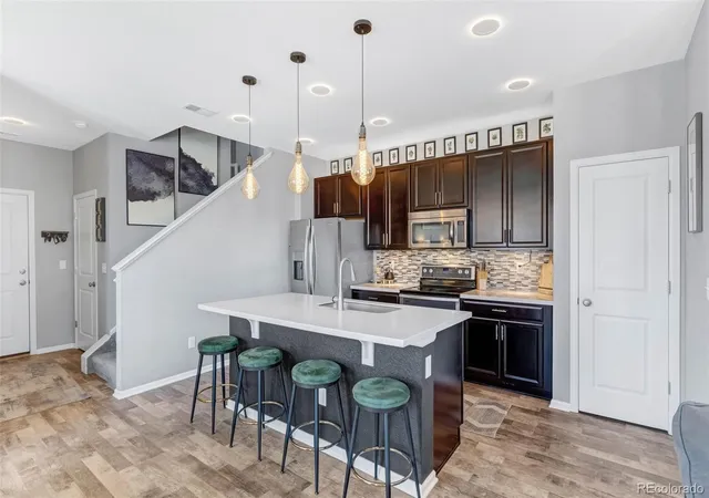 Photo 3 of Townhouse for sale at 1218 S Clinton St, Denver, CO 80247 | MLS# 9135444 | Listing updated on 2026-08-03
