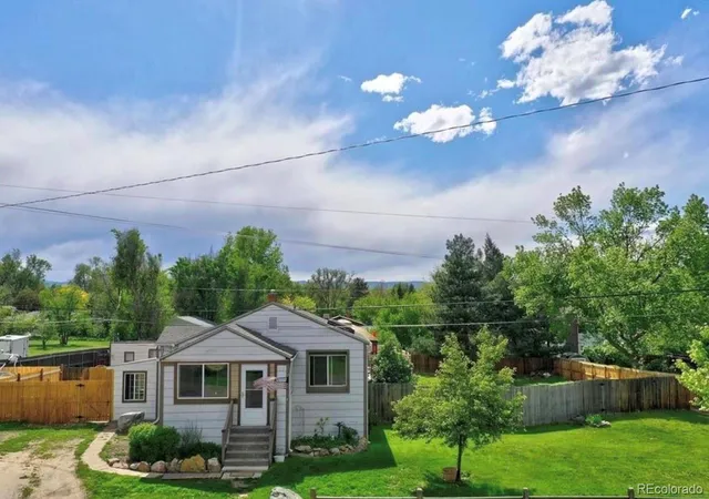 Photo 1 of Single family home for sale at 105 S Newland St, Lakewood, CO 80226 | MLS# 2313884 | Listing updated on 2026-07-20